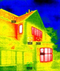 A thermal camera image of the outside of a house